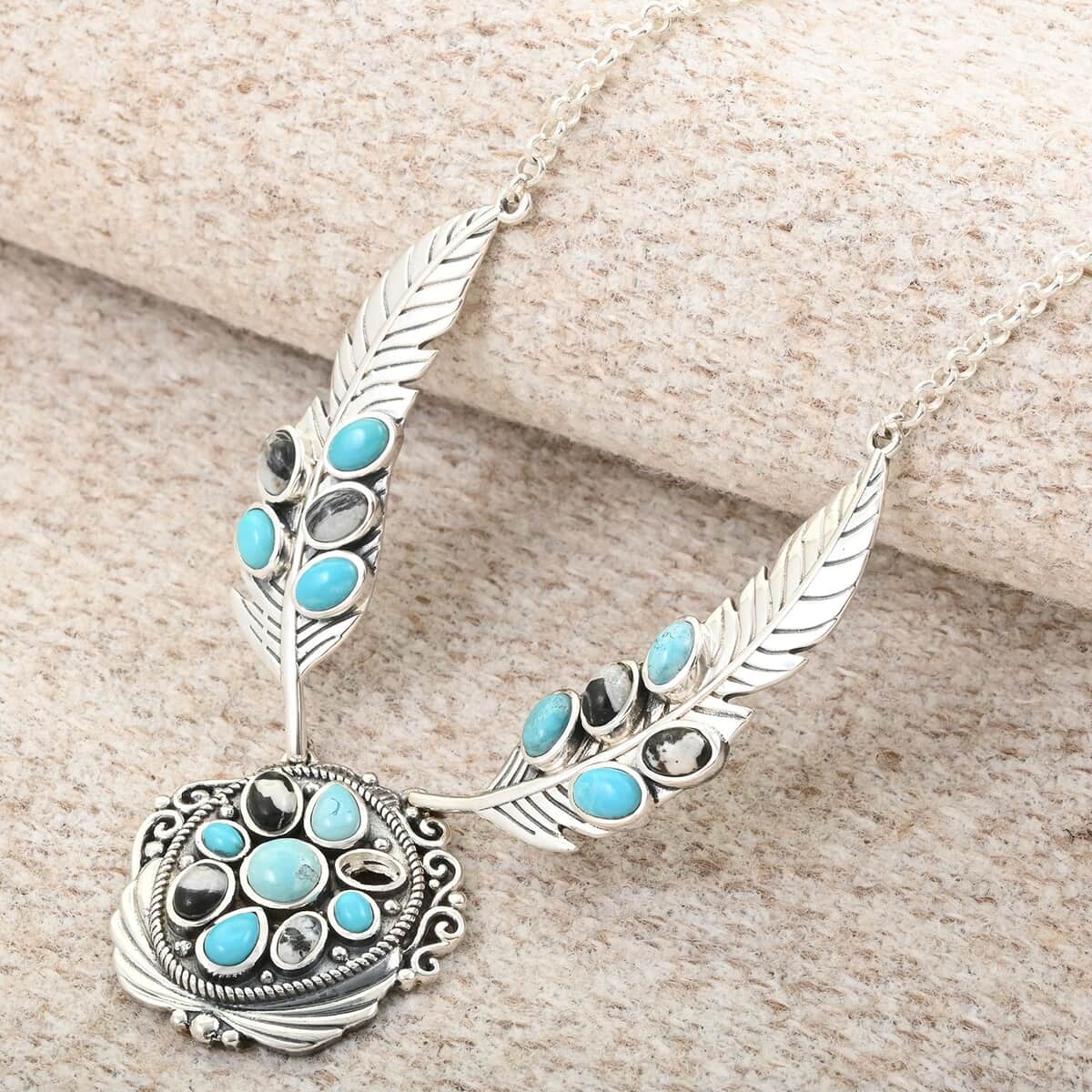 Artisan Crafted Sleeping Beauty Turquoise and White Buffalo Feather Necklace 18-20 Inches in Sterling Silver 8.15 ctw image number 1