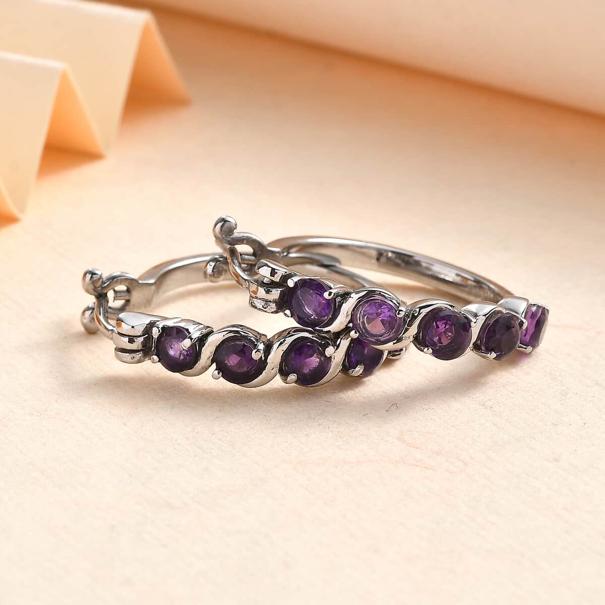 African Amethyst 2.10 ctw Hoop Earrings in Stainless Steel  image number 1