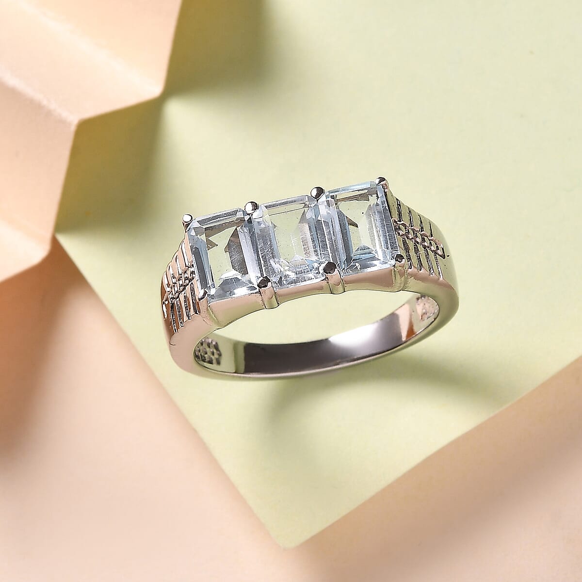 Sky Blue Topaz 3.65 ctw 3 Stone Ring in Stainless Steel (Size 10.0) image number 1