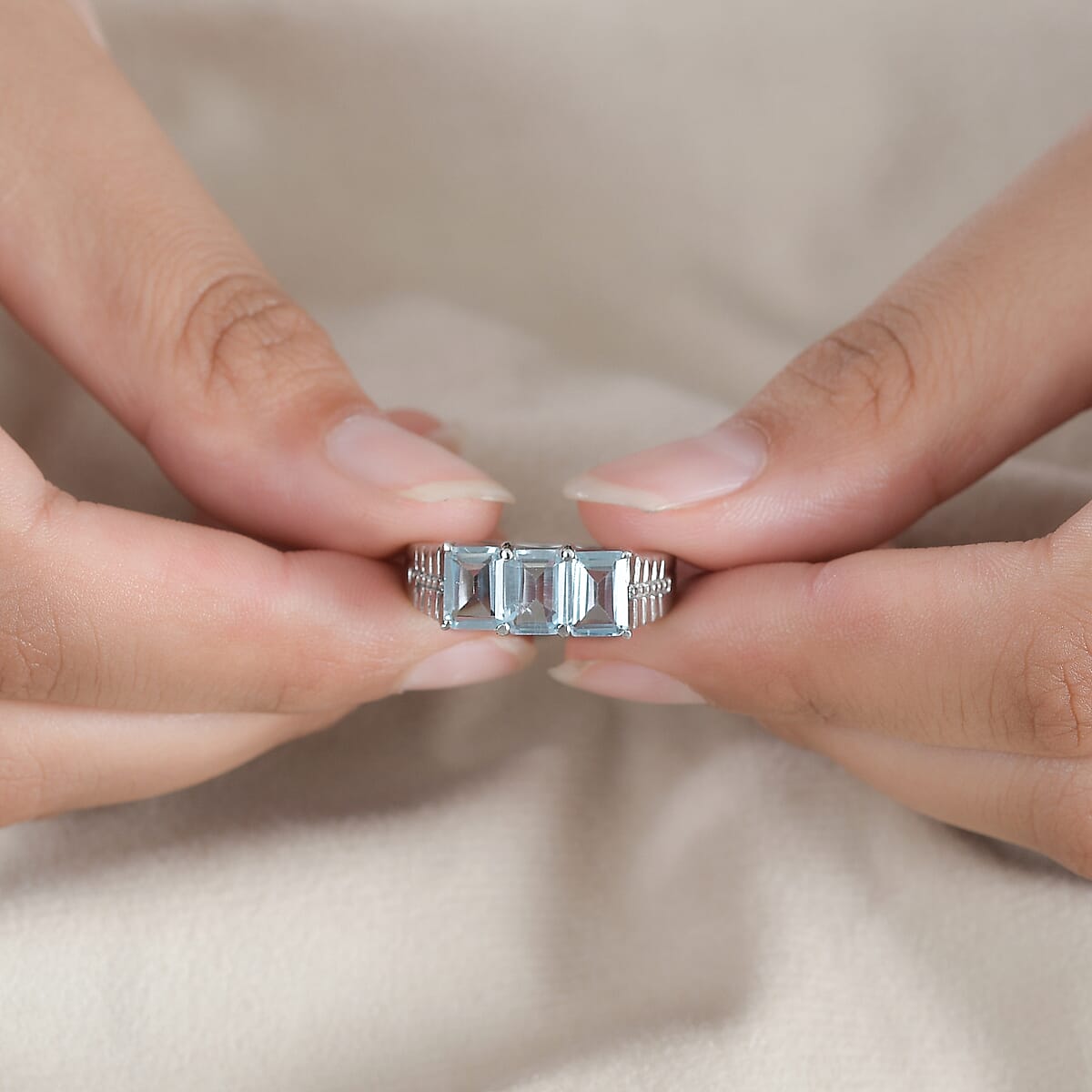 Sky Blue Topaz 3.65 ctw 3 Stone Ring in Stainless Steel (Size 11.0) image number 2