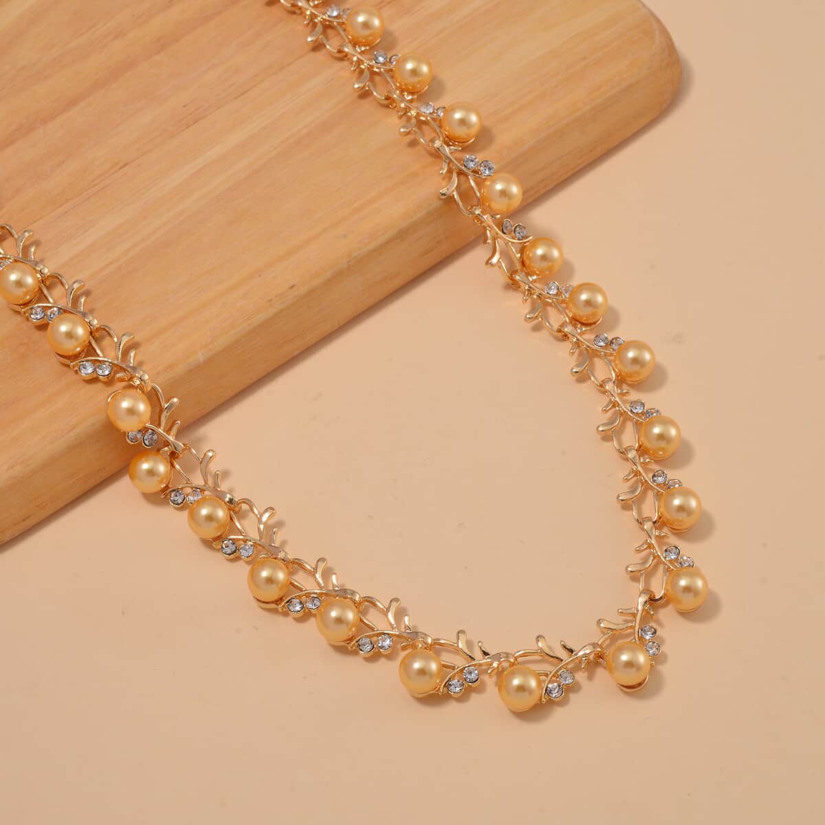 Golden Shell Pearl and White Crystal Necklace 18-20 Inches in Goldtone image number 1