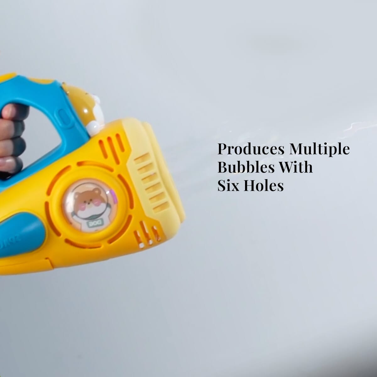 Yellow Rechargeable Bubble Gun with 6 Holes with Cute Cartoon Figure (500 mAh) image number 4