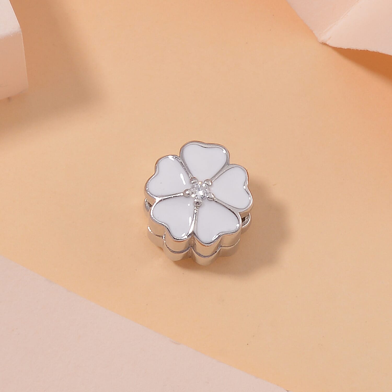 Simulated Diamond and Enameled Flower Charm in Rhodium Over Sterling Silver