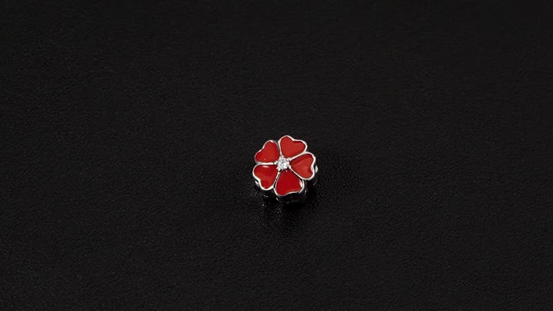Simulated Diamond and Enameled Red Flower Charm in Rhodium Over Sterling Silver