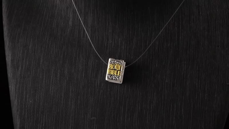 A Bible Charm in 14K YG Over and Black Oxidized Sterling Silver