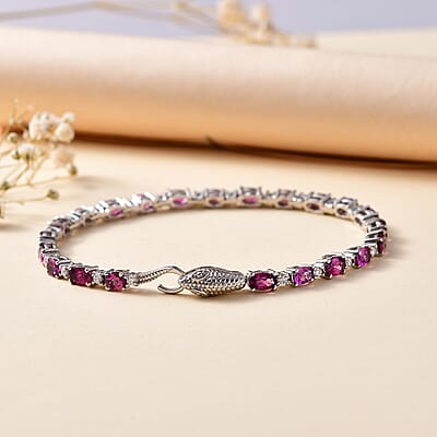 D'Joy Radiant Ember Garnet and Moissanite Serpent Bracelet in Rhodium Over Sterling Silver (6.50 In) 6.40 ctw