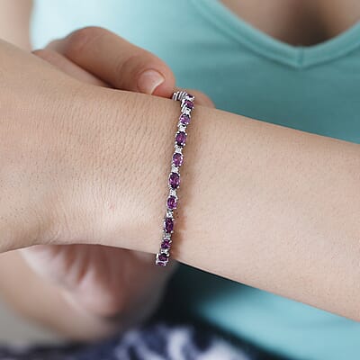 D'Joy Radiant Ember Garnet and Moissanite Serpent Bracelet in Rhodium Over Sterling Silver (6.50 In) 6.40 ctw