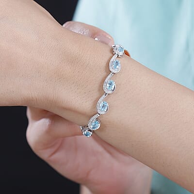 D'Joy Premium Betroka Blue Apatite and Moissanite 6.75 ctw Sea Waves Bracelet in Rhodium Over Sterling Silver (6.50 In)