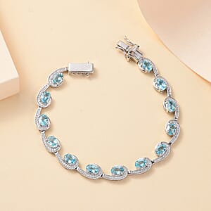 D'Joy Premium Betroka Blue Apatite and Moissanite 6.90 ctw Sea Waves Bracelet in Rhodium Over Sterling Silver (7.25 In)
