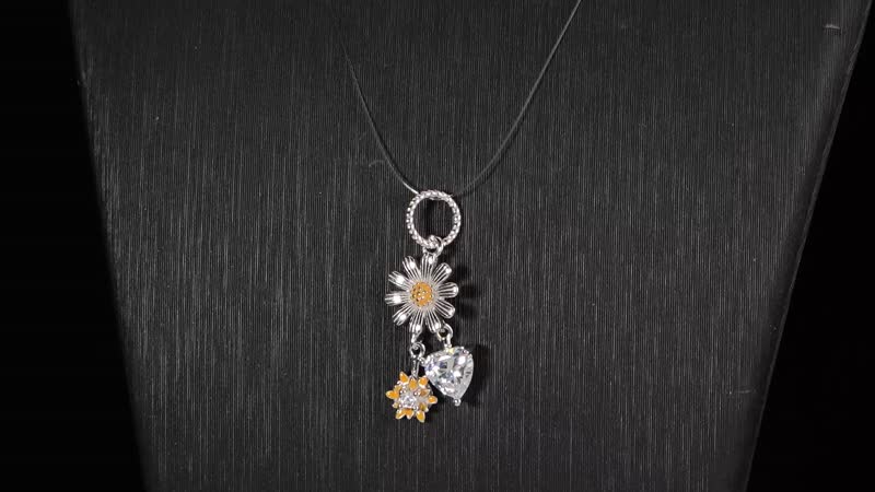 Simulated Diamond and Enameled Daisy Love Charm in Rhodium Over Sterling Silver