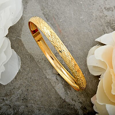 Italian 10K Yellow Gold 6.9mm Diamond-Cut Flex Bangle Bracelet (6.50 In) 3.50 Grams