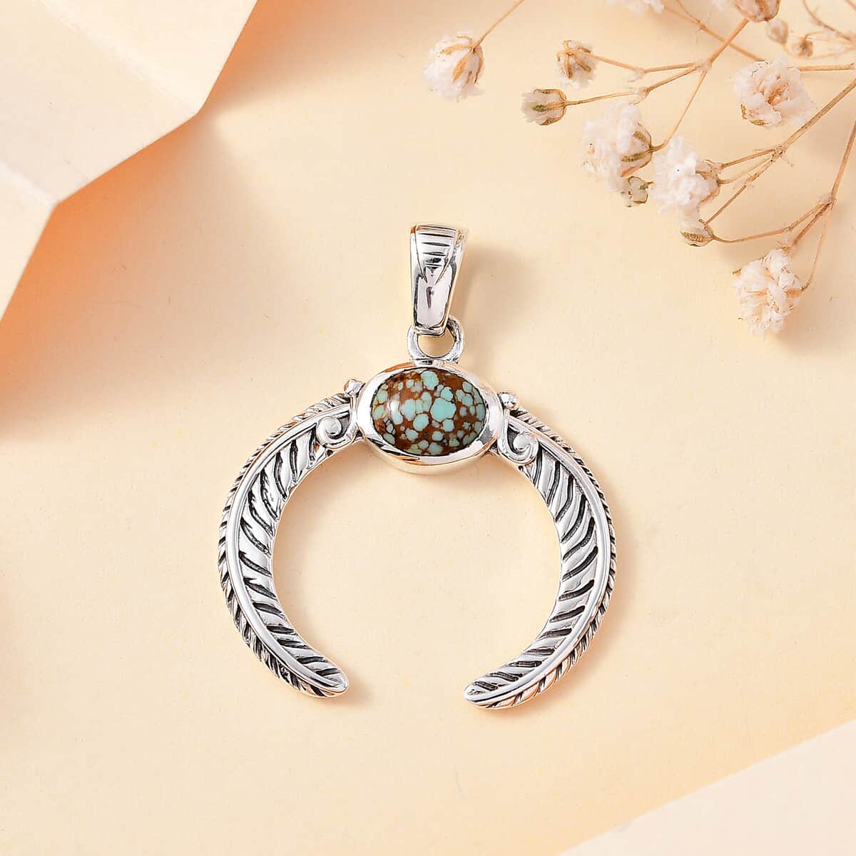 Artisan Crafted Blue Horizon Turquoise 1.00 ctw Naja Pendant in Sterling Silver image number 1