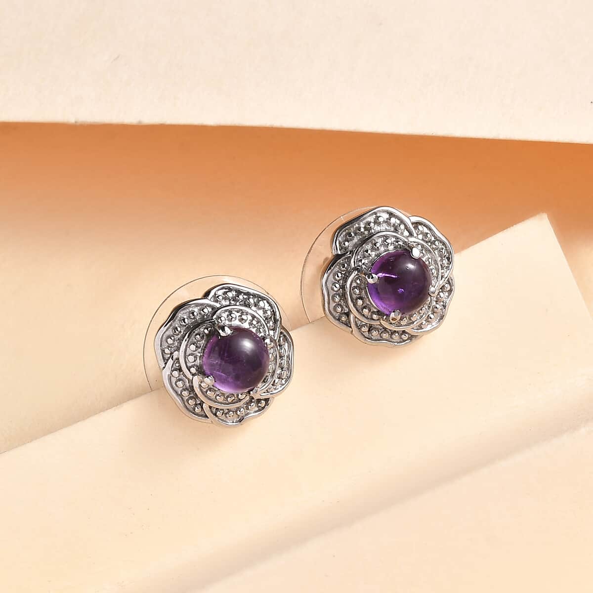 African Amethyst 1.10 ctw Knotted Earrings in Stainless Steel image number 1