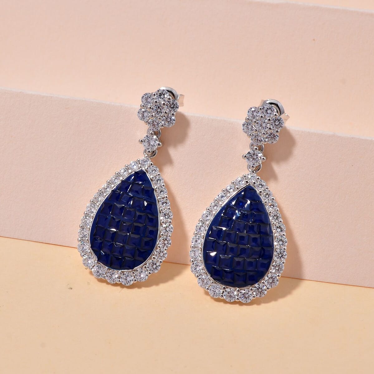 Simulated White and Blue Diamond Drop Earrings in Rhodium Over Sterling Silver image number 1