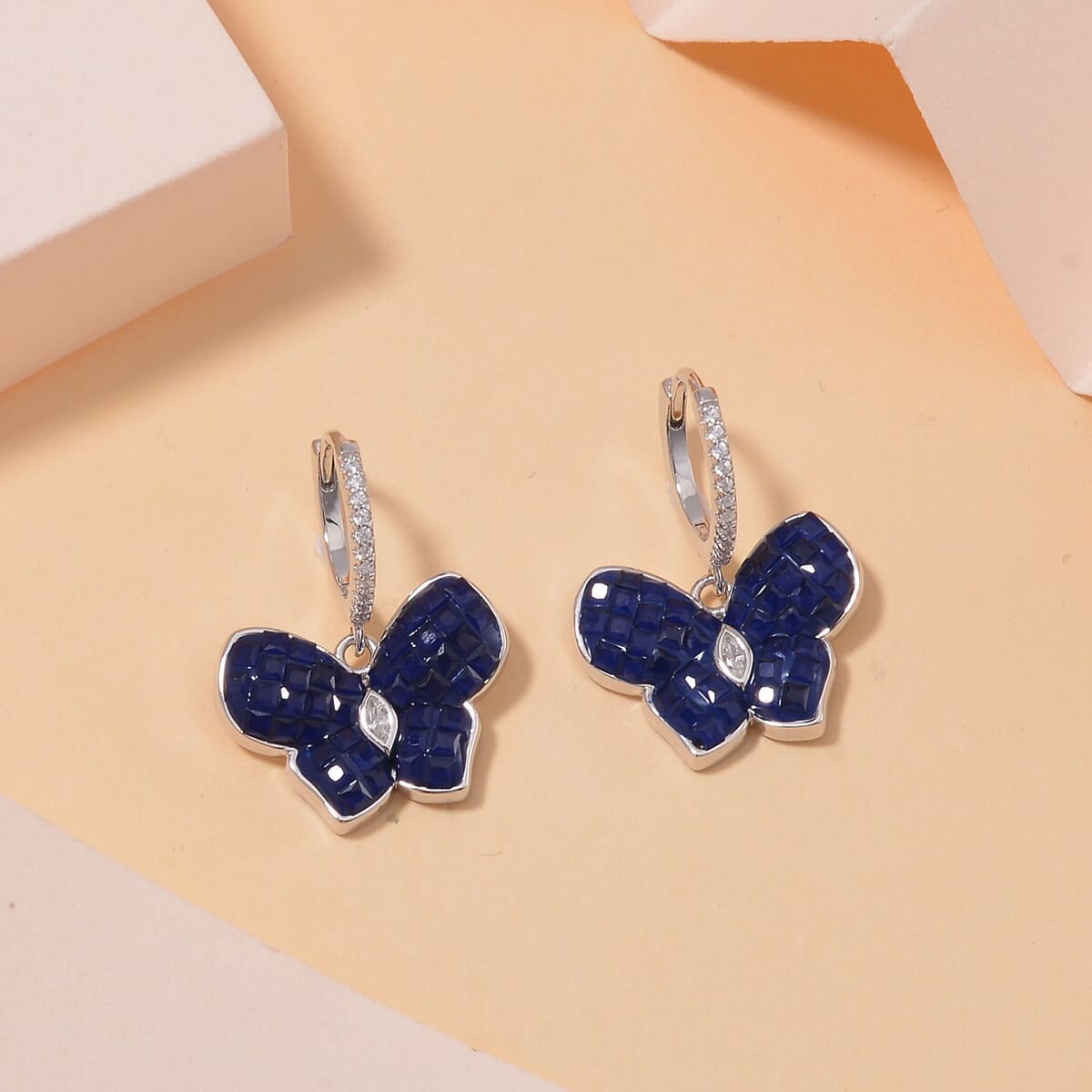 Simulated White and Blue Diamond Butterfly Earrings in Rhodium Over Sterling Silver image number 1