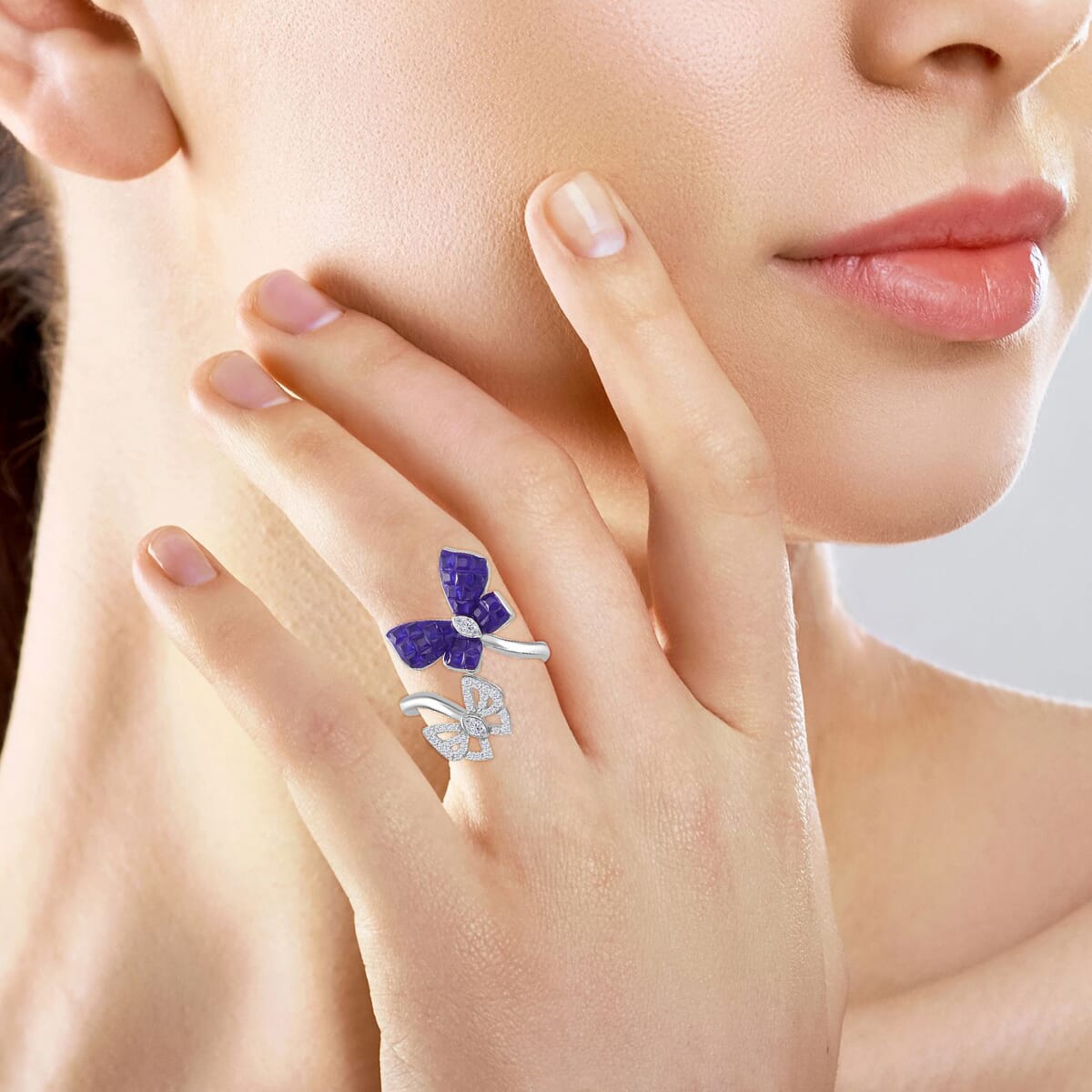 Simulated White and Blue Diamond Butterfly Bypass Ring in Rhodium Over Sterling Silver (Size 5.0) image number 2