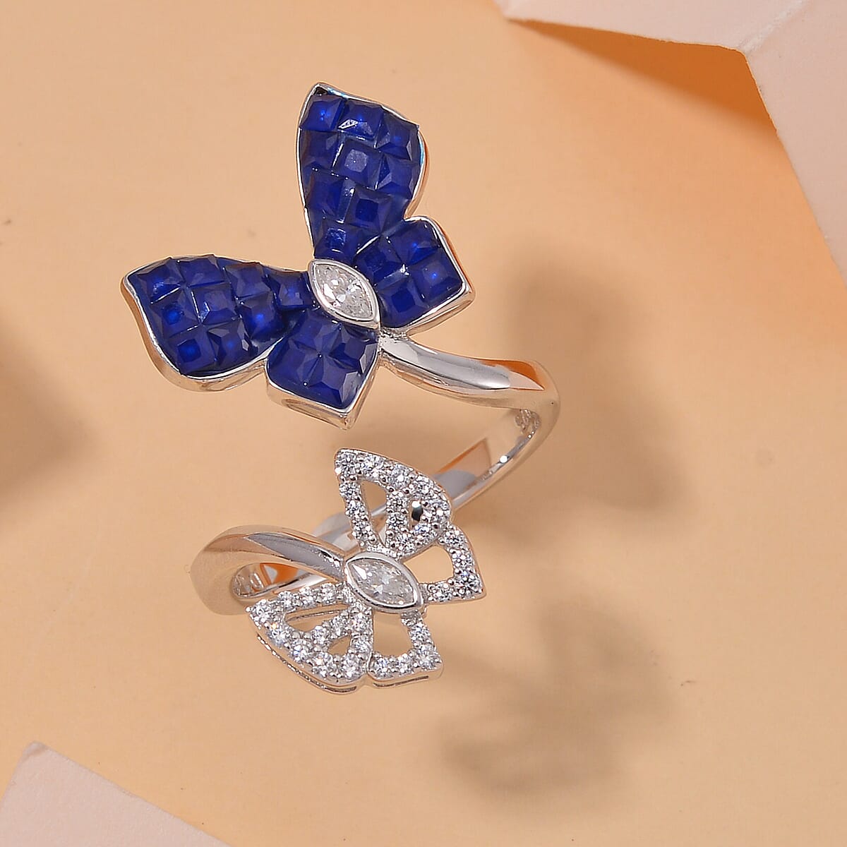 Simulated White and Blue Diamond Butterfly Bypass Ring in Rhodium Over Sterling Silver (Size 9.0) image number 1