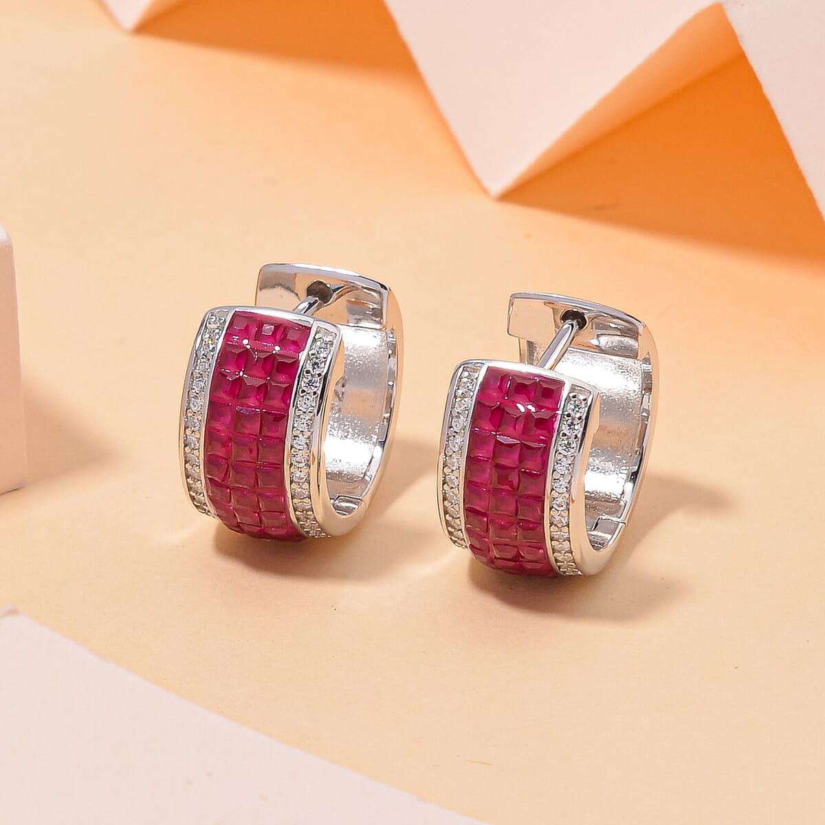 Simulated White and Ruby Color Diamond Hoop Earrings in Rhodium Over Sterling Silver image number 1