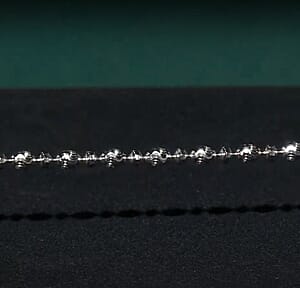 Italian Rhodium Over Sterling Silver Diamond-cut Saturno Chain Bracelet (7.50 In) 5.20 Grams