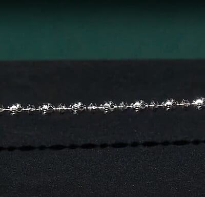 Italian Rhodium Over Sterling Silver Diamond-cut Saturno Chain Bracelet (7.50 In) 5.20 Grams