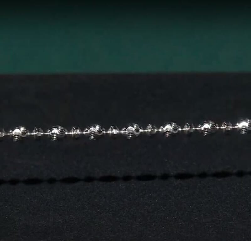 Italian Rhodium Over Sterling Silver Diamond-cut Saturno Chain Bracelet (7.50 In) 5.20 Grams