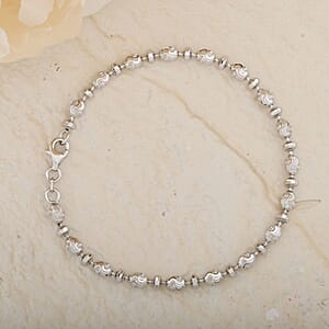 Italian Rhodium Over Sterling Silver Diamond-cut Saturno Chain Bracelet (7.50 In) 5.20 Grams