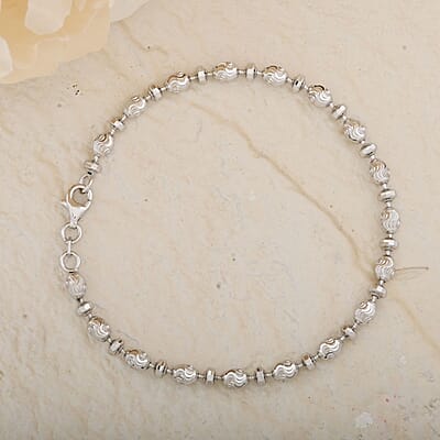 Italian Rhodium Over Sterling Silver Diamond-cut Saturno Chain Bracelet (7.50 In) 5.20 Grams