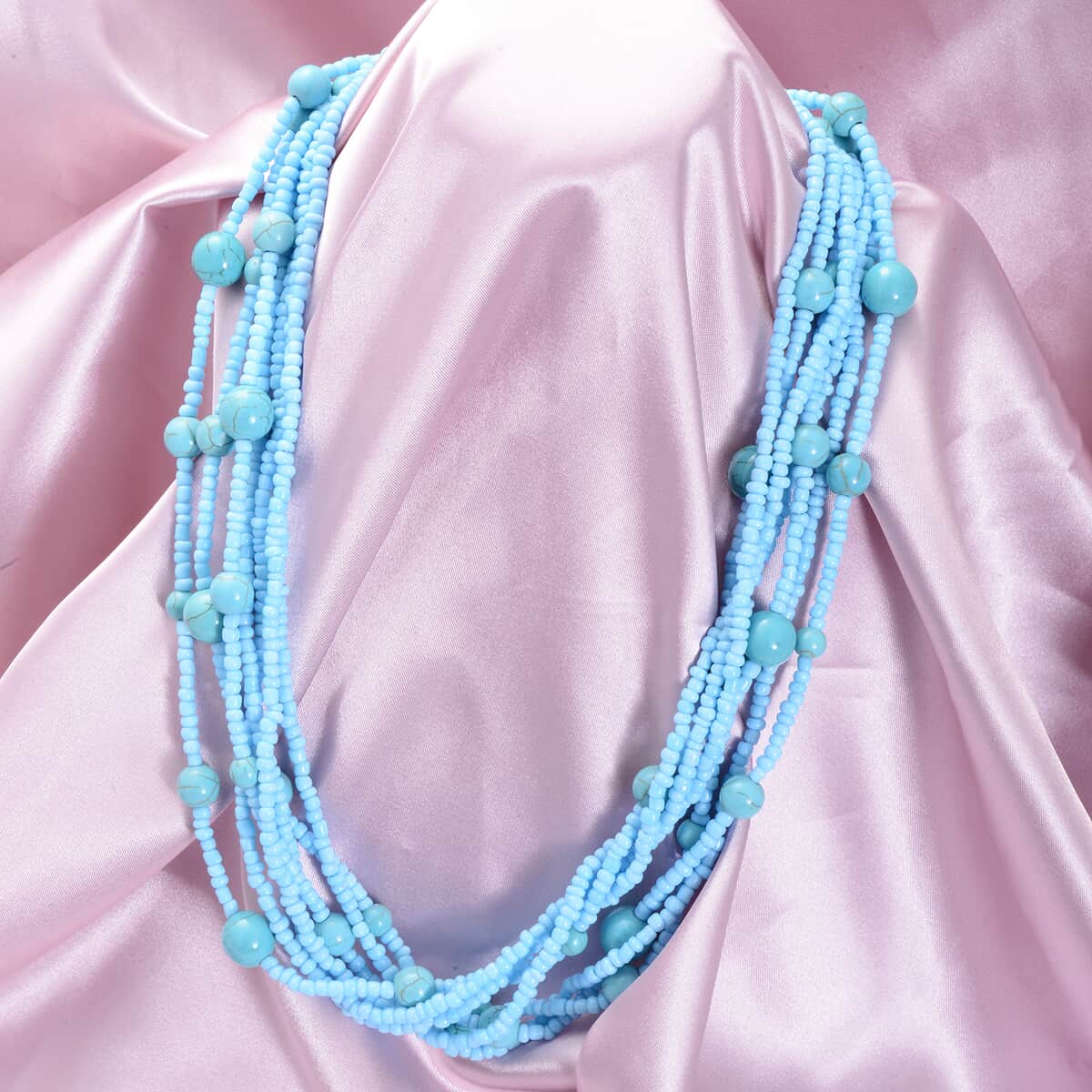 Blue Howlite 80.50 ctw and Simulated Blue Pearl Twisted Multi Row Beaded Station Necklace 18-20 Inches in Silvertone image number 1