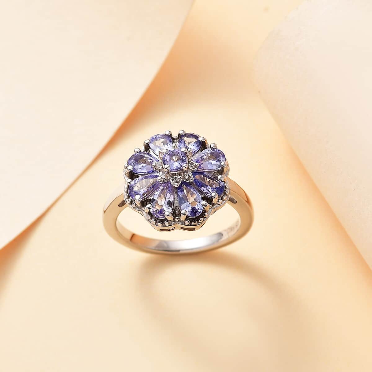 Tanzanite and White Zircon 1.65 ctw Daisy Floral Ring in Rhodium Over Sterling Silver (Size 8.0) image number 1