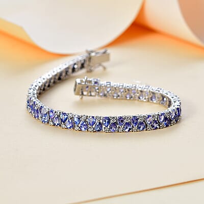 Tanzanite and White Zircon 11.75 ctw Bracelet in Rhodium Over Sterling Silver (7.25 In)