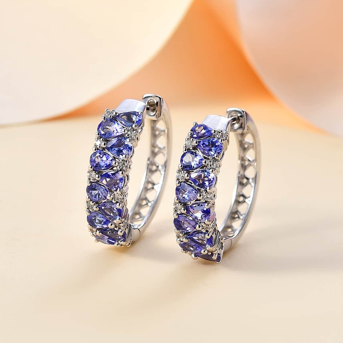 Tanzanite and White Zircon 3.25 ctw Hoop Earrings in Rhodium Over Sterling Silver image number 1