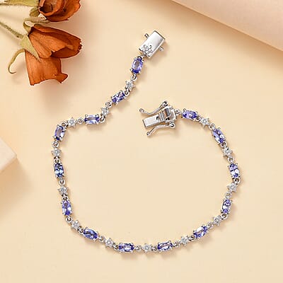 Tanzanite and White Zircon 3.85 ctw Celestial Bracelet in Rhodium Over Sterling Silver (7.25 In)
