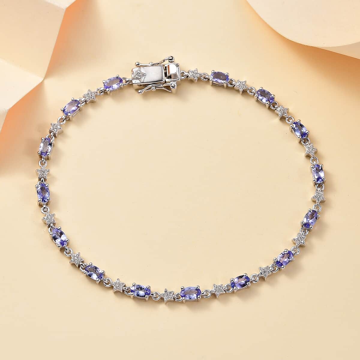 Tanzanite and White Zircon 4.00 ctw Celestial Bracelet in Rhodium Over Sterling Silver (8.00 In) image number 1