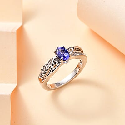 AAA Tanzanite and White Zircon 0.60 ctw Infinity Ring in Rhodium Over Sterling Silver (Size 10.0)