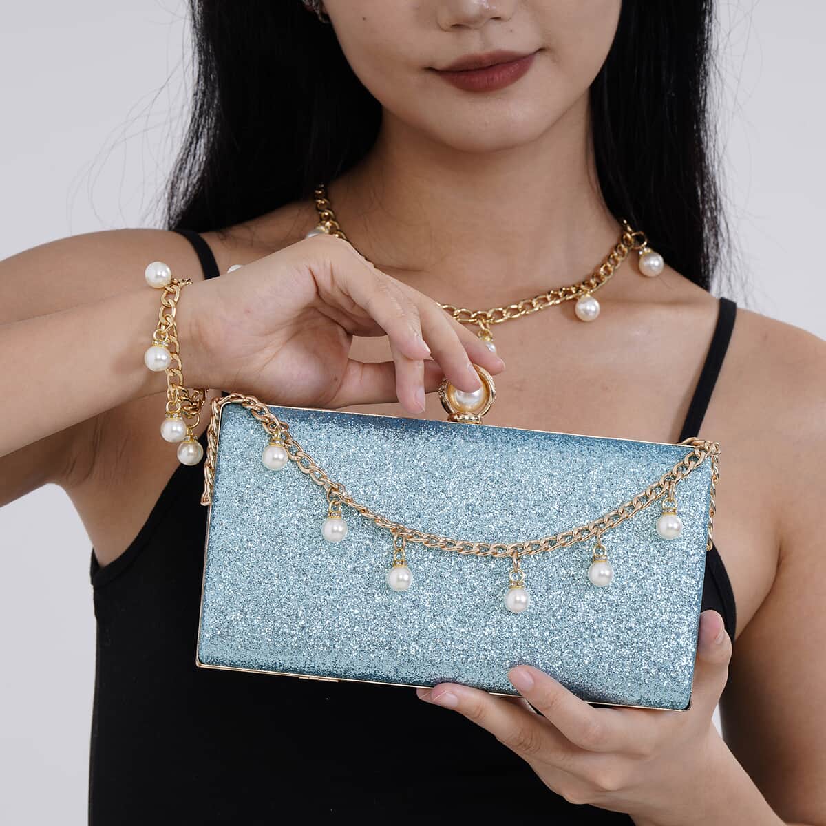 Doorbuster, Set of 3, Blue Color Sparkling Clutch with matching White Pearl Bracelet (7.5-8.5 inch) and Necklace (18-20 inch) With Gold tone  image number 2