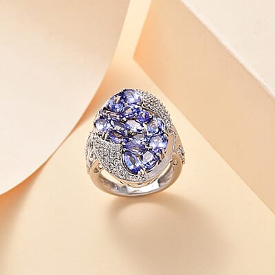 Tanzanite and White Zircon 4.40 ctw Leaves Ring in Rhodium Over Sterling Silver (Size 10.0)