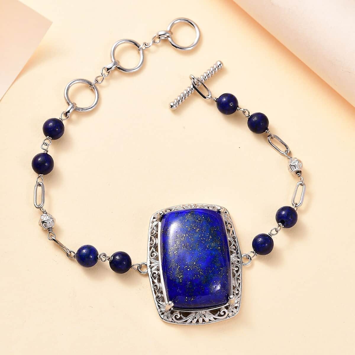 Lapis Lazuli 55.80 ctw Toggle Clasp Bracelet in Platinum Over Copper with Magnet (6.50 -8.00In) image number 1