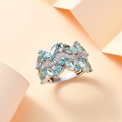 Madagascar Lagoon Apatite and Moissanite 3.25 ctw Waves Ring in Rhodium Over Sterling Silver (Size 10.0)