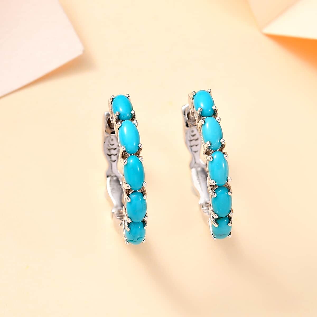 Sleeping Beauty Turquoise 1.90 ctw Fish Hoop Earrings in Rhodium Over Sterling Silver image number 1