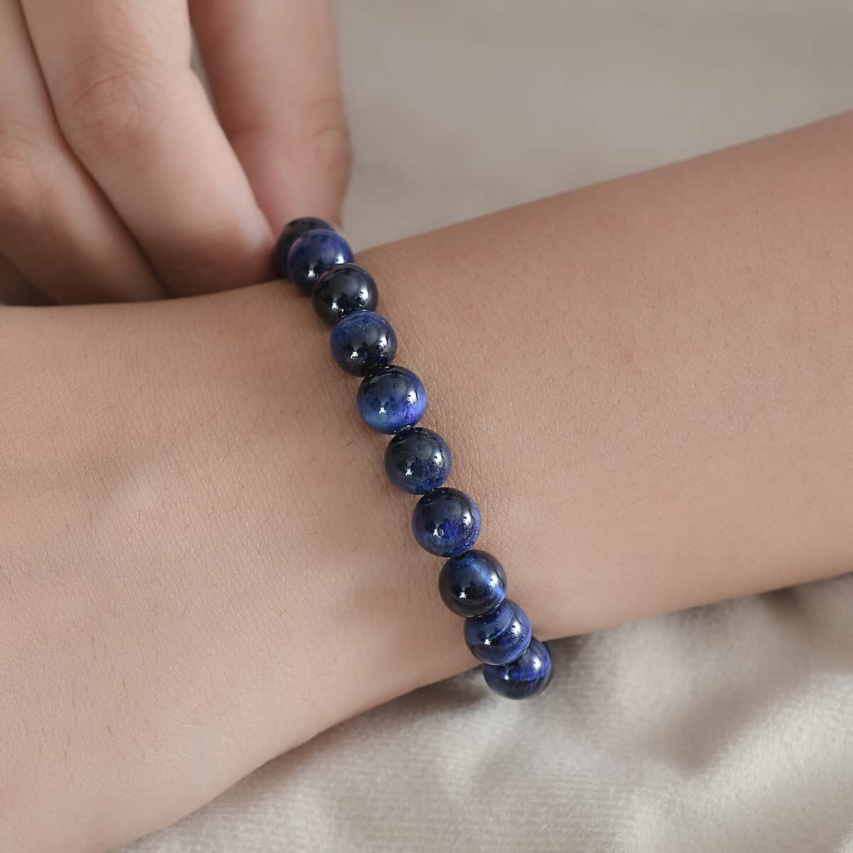 Enhanced Blue Tiger's Eye 107.00 ctw Beaded Stretch Bracelet image number 2