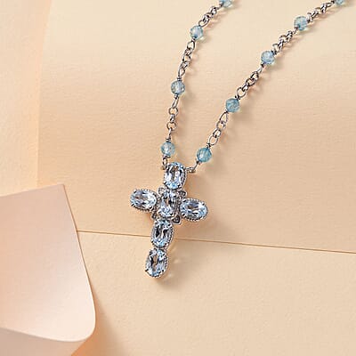 Karis Sky Blue Topaz 7.60 ctw Cross Necklace in Platinum Bond and Stainless Steel 18-20 Inches