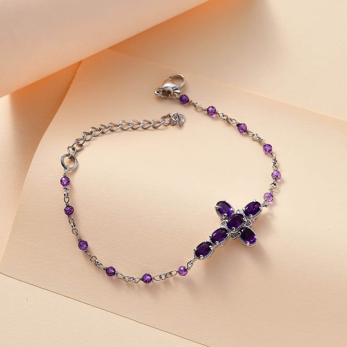 Karis African Amethyst 5.50 ctw Cross Bracelet in Platinum Bond (7.25-8.75In) image number 1