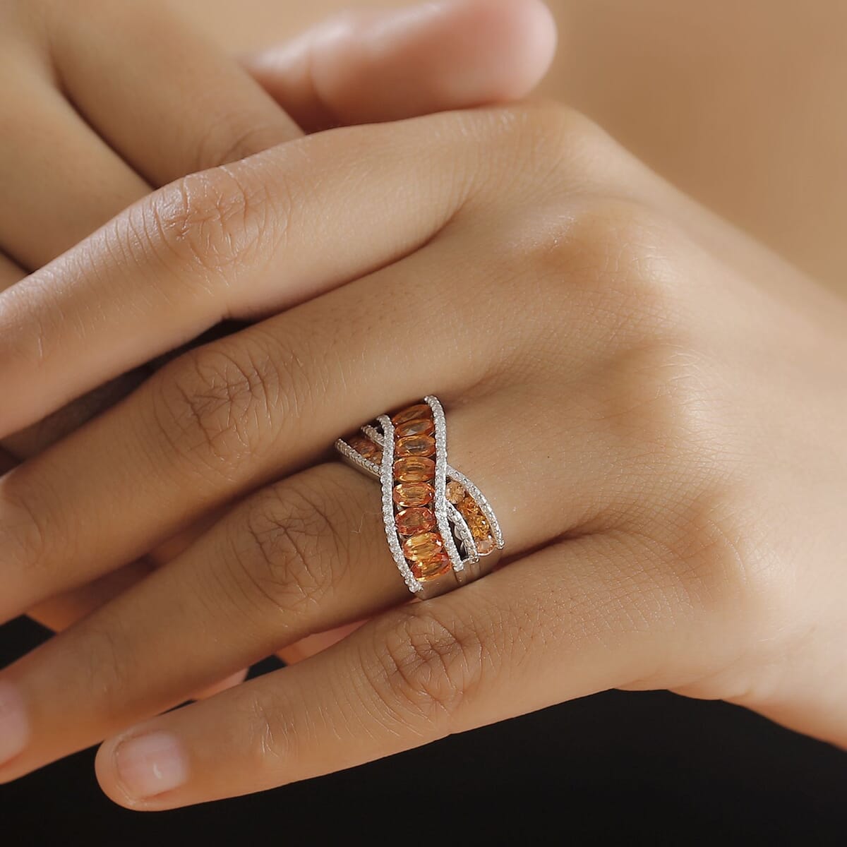 Madagascar Orange Sapphire and White Zircon 3.90 ctw Bridge Over Ring in Rhodium Over Sterling Silver (Size 6.0) image number 2