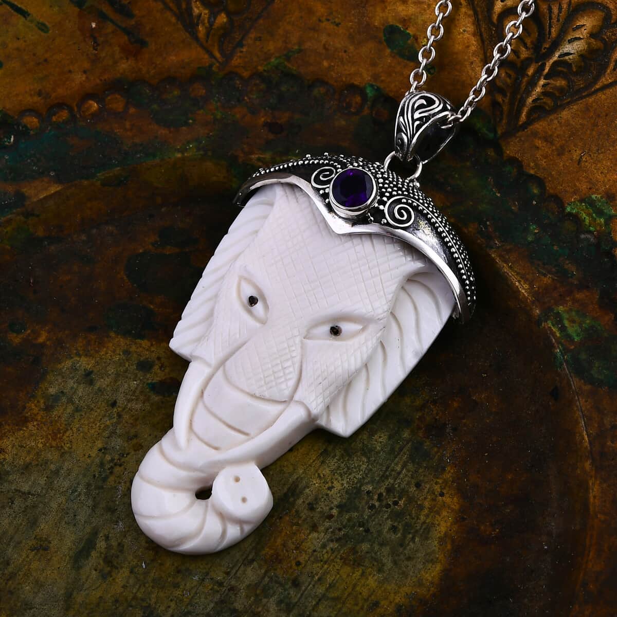 Bali Goddess Carved Bone and African Amethyst 0.75 ctw Elephant Pendant in Sterling Silver image number 1