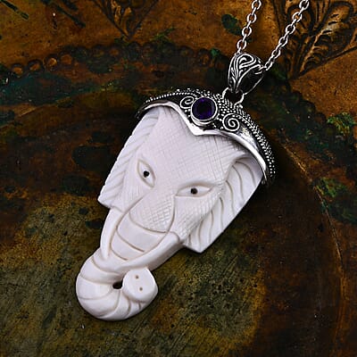 Bali Goddess Carved Bone and African Amethyst 0.75 ctw Elephant Pendant without Chain in Sterling Silver