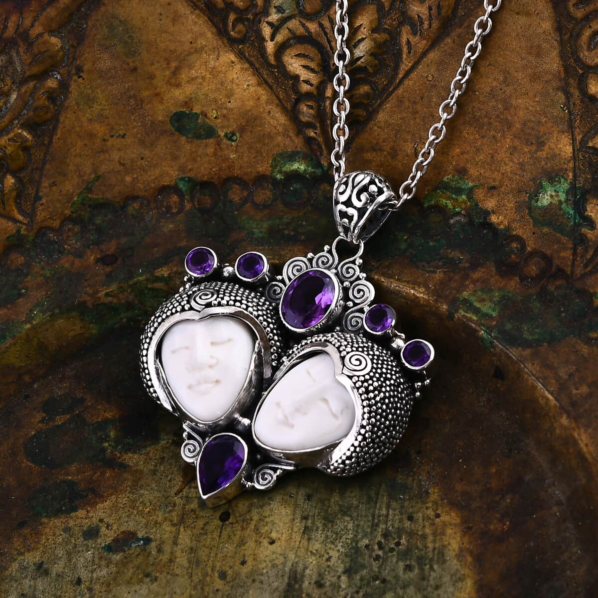 Bali Goddess Carved Bone and African Amethyst 3.70 ctw Royal Romance Pendant in Sterling Silver image number 1