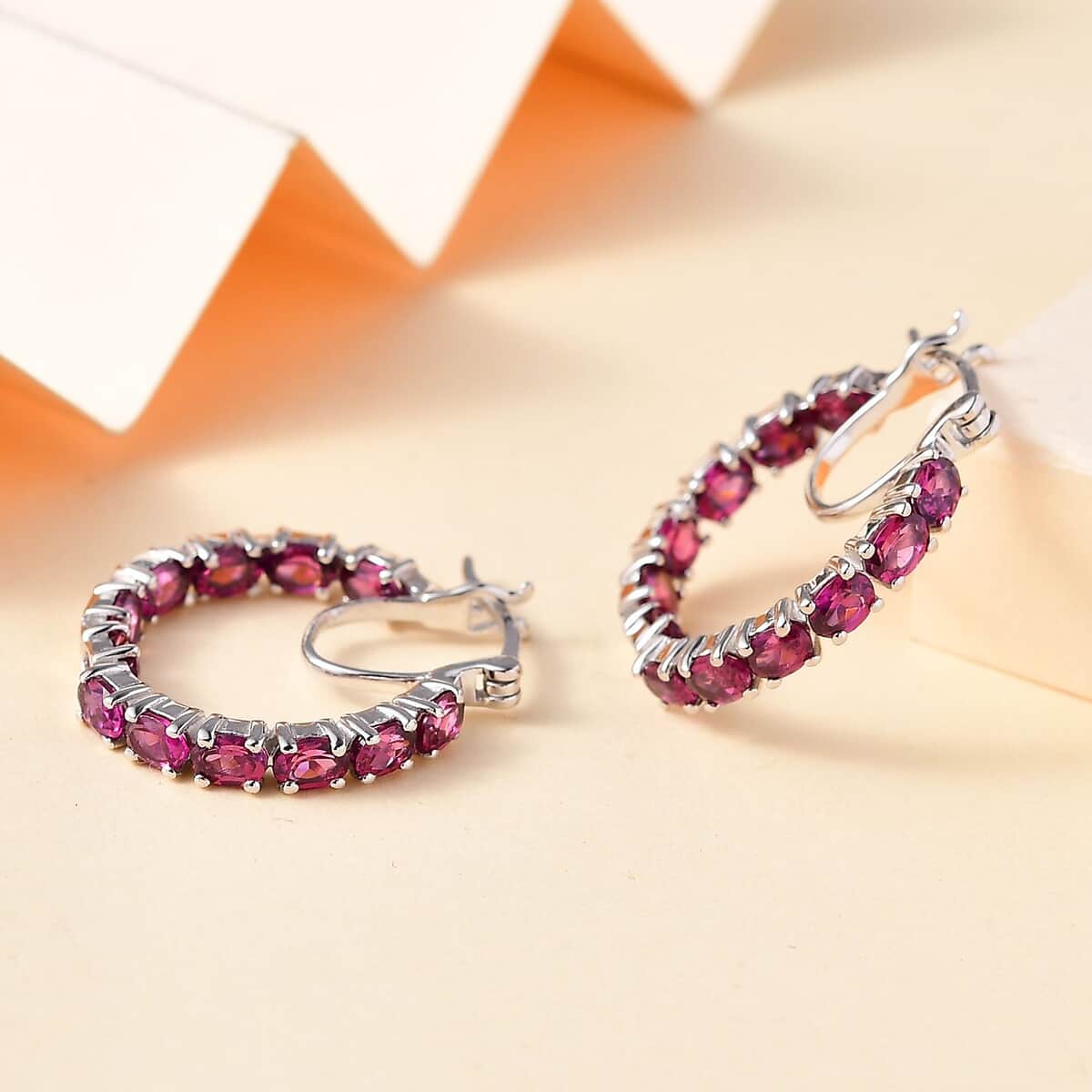 Doorbuster Radiant Ember Garnet 5.40 ctw Inside-out Hoop Earrings in Rhodium Over Sterling Silver image number 1