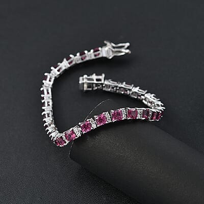 D'Joy Tanzanian Wine Garnet and White Zircon 15.10 ctw Royal Radiance Tennis Bracelet in Rhodium Over Sterling Silver (7.25 In)