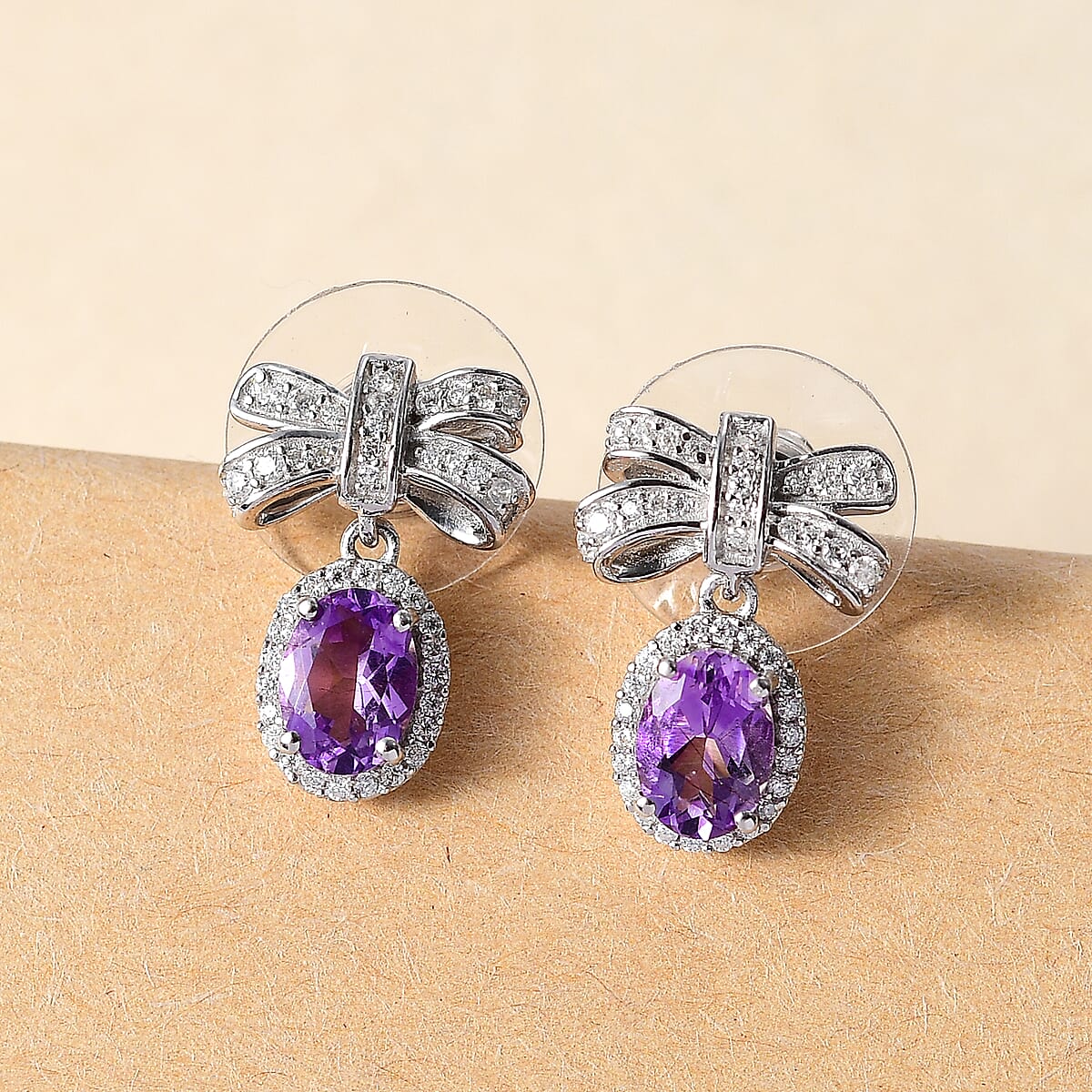 Moroccan Rose and Moissanite 2.00 ctw Love Bow Earrings in Rhodium Over Sterling Silver image number 1