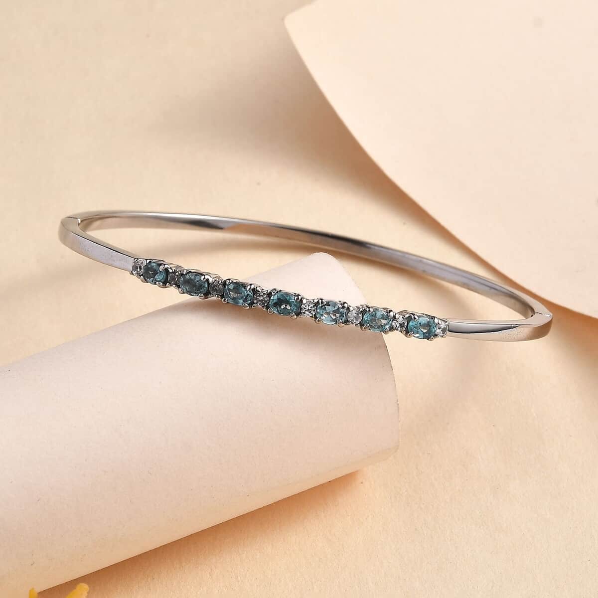 Doorbuster Betroka Blue Apatite and White Zircon 1.65 ctw Bangle Bracelet in Stainless Steel (7.25 In) image number 1